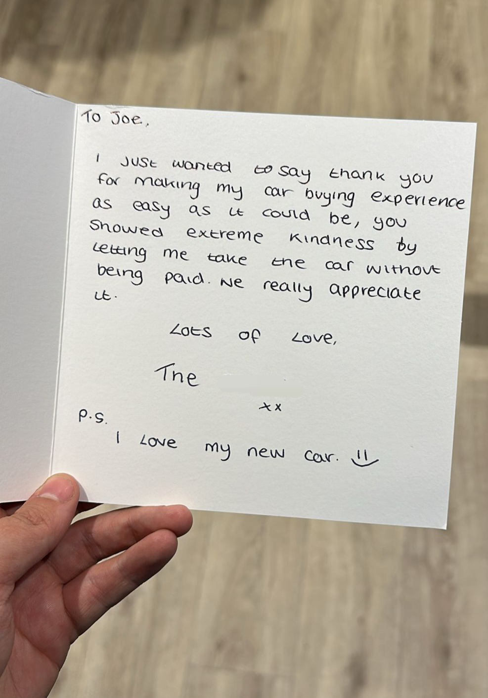A handwritten thank-you card to Joe from a customer: thank you for making my car buying experience as easy as it could be. P.S. I love my new car